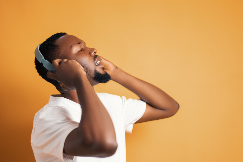 Man listening to music on headphones