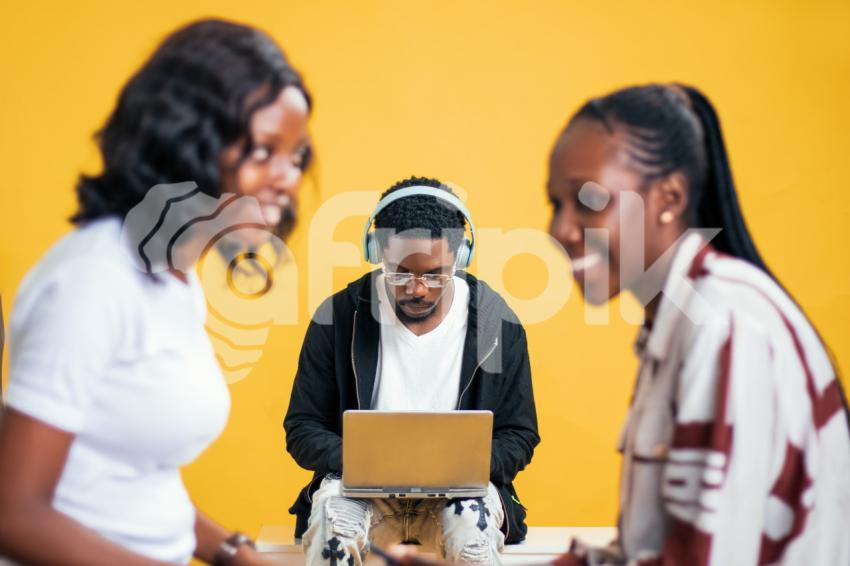 Boy pressing his laptop