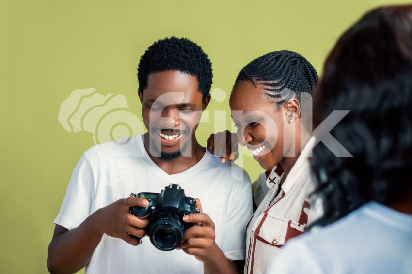 Boy and girl with a camera