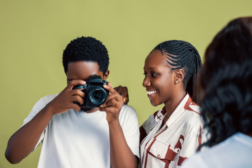 Boy taking pictures with a camera