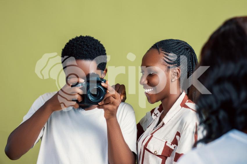 Boy taking pictures with a camera