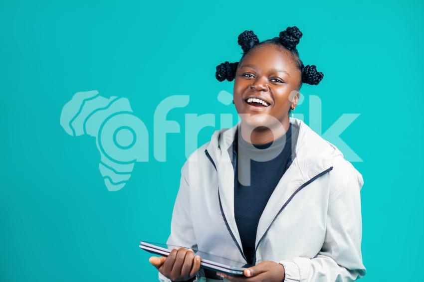 Girl with her laptop smiling