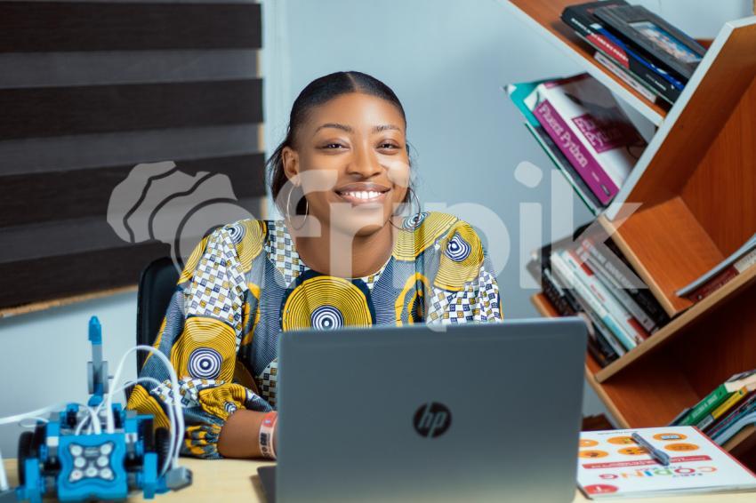 Girl with latop in an office