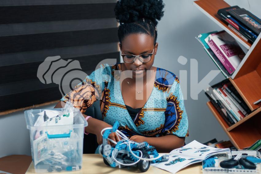 Stem educator with her robotics kit