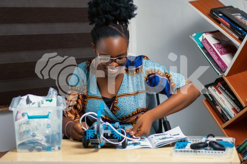 Stem educator with her robotics kit