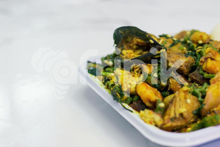 A plate of seafood okro 1
