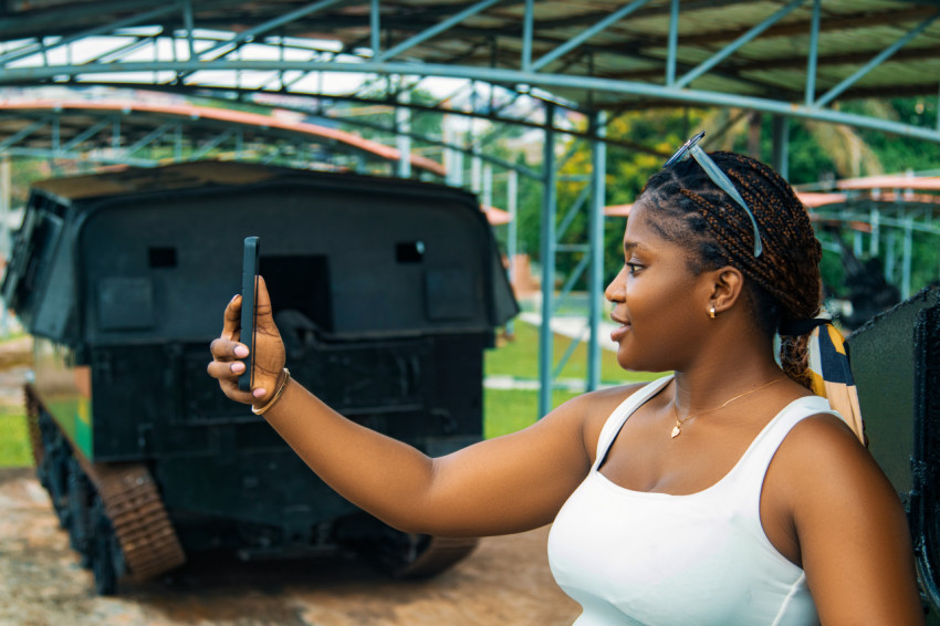 Girl taking a selfie with her phone