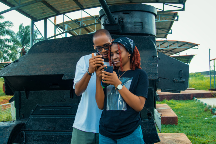 Boy and girl looking at their phones in NWM