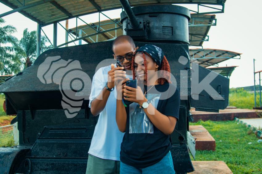 Boy and girl looking at their phones in NWM