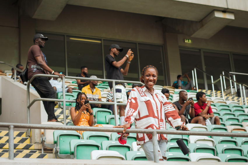 People watching a game in the stadium