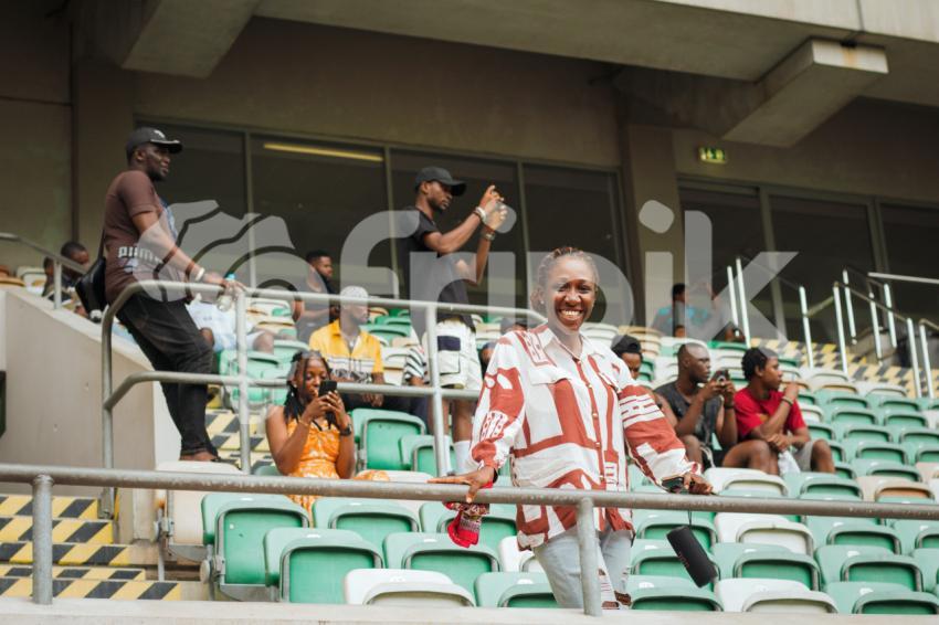 People watching a game in the stadium