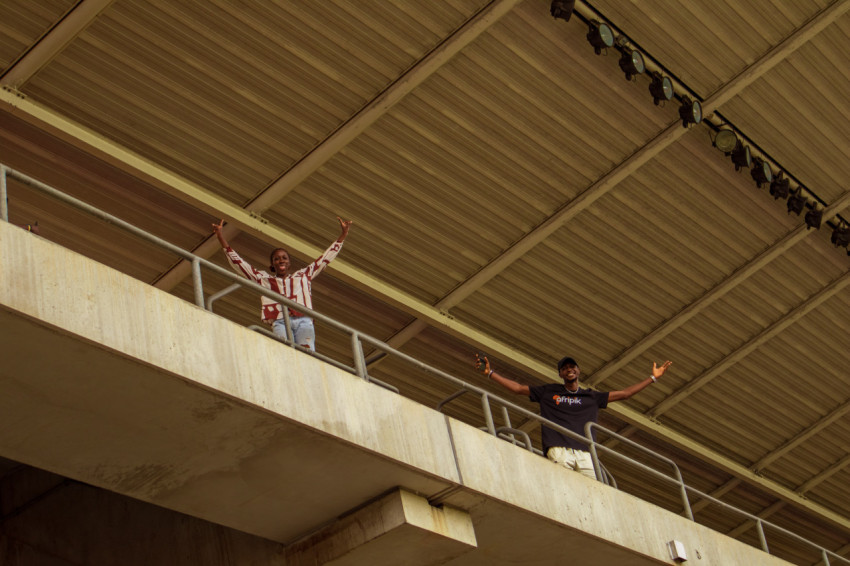 boy and girl cheering from top