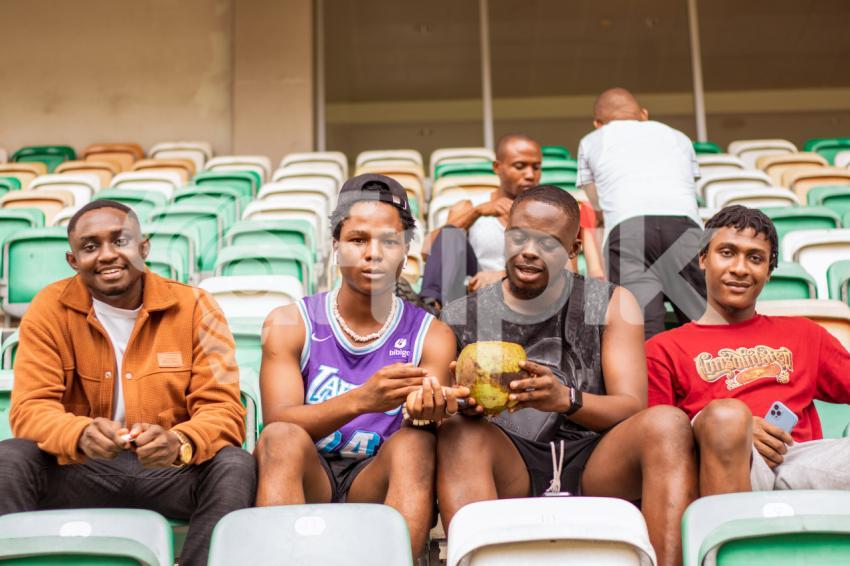 Boys sittingin stadium