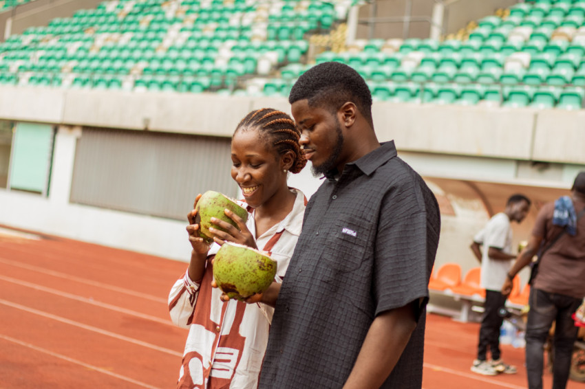 boy and girl with coconut drink 1