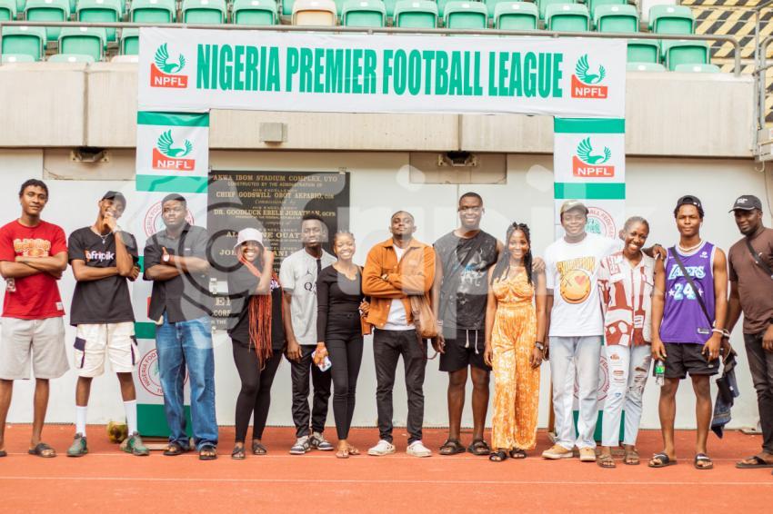 A Group of people standing 2