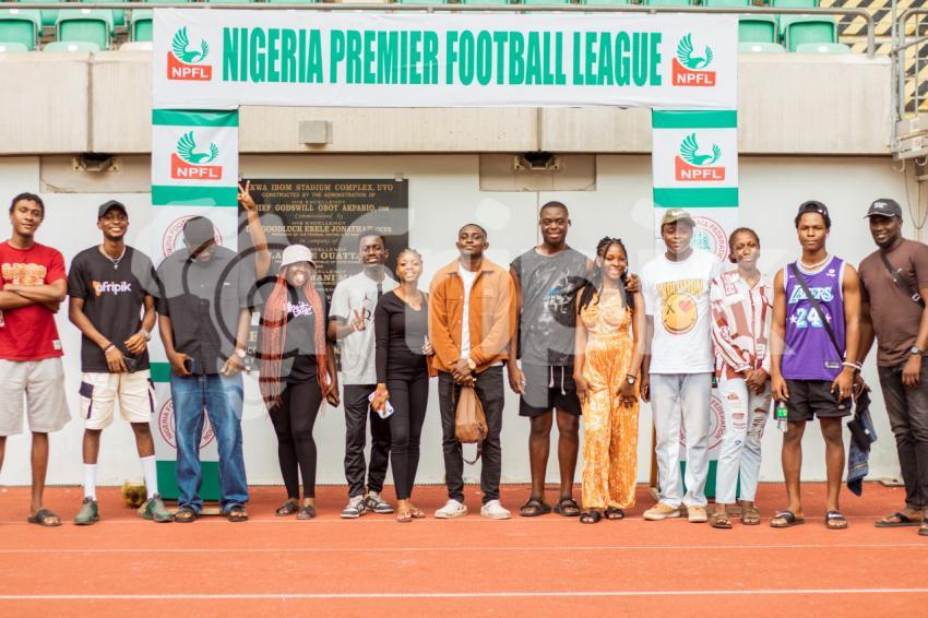 A group of people standing 1