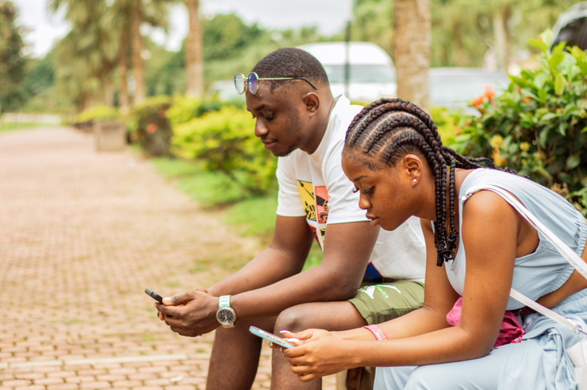 A boy and girl sitting 1