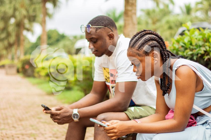 A boy and girl sitting 3