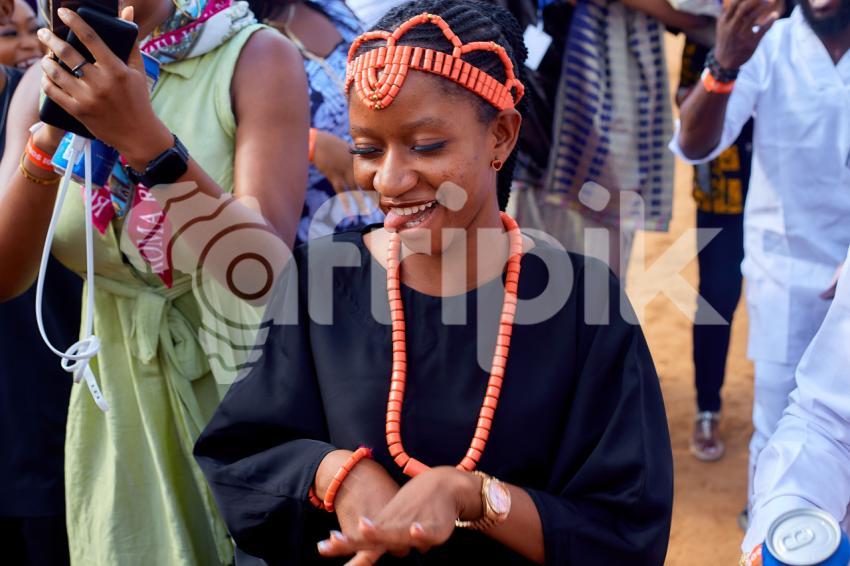 A lady dancing cheerfully