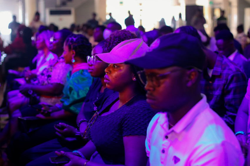 Attendees listening to the speaker at UDC 2024