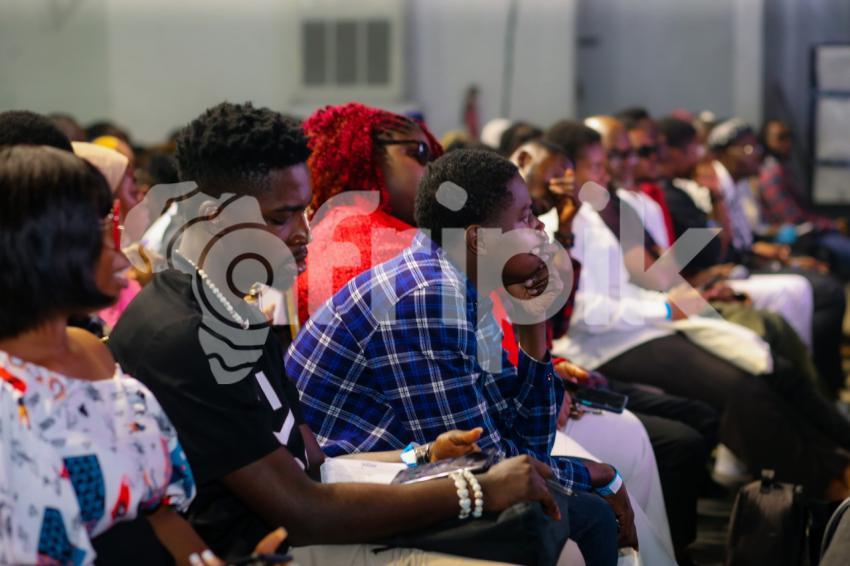 Attendees paying attention to the speaker
