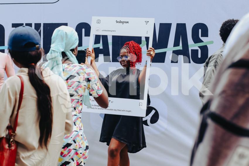 Attendee taking pictures at UDC 2024