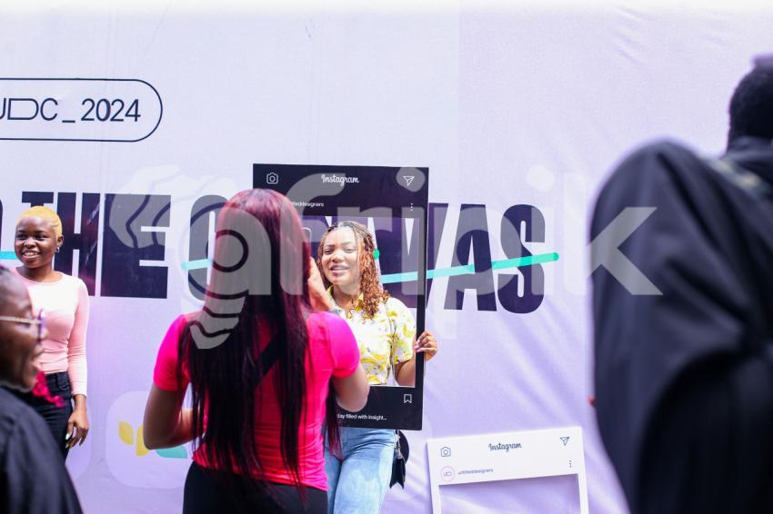 Attendee taking pictures at UDC 2024