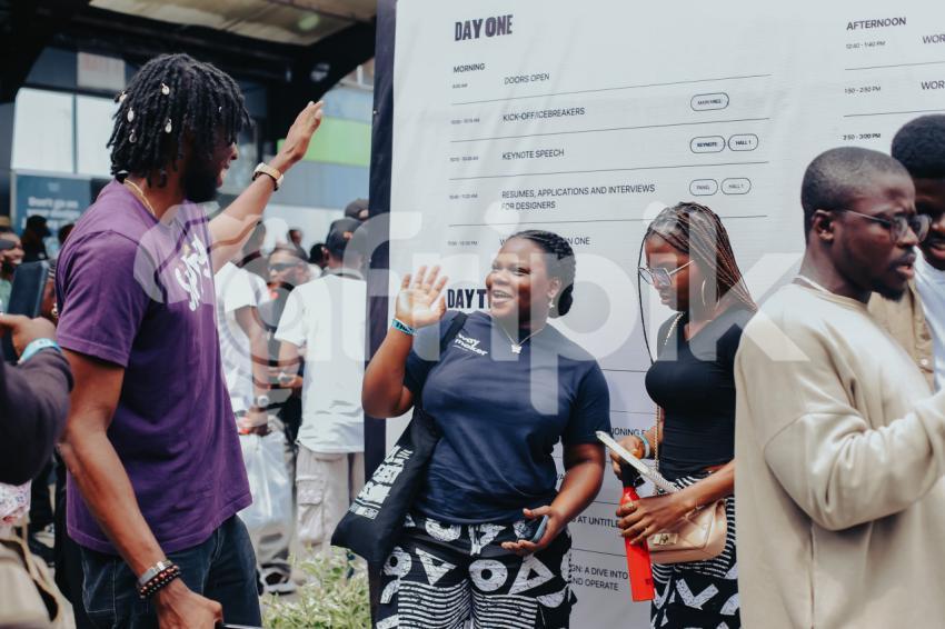 Two friends giving themselves a high 5