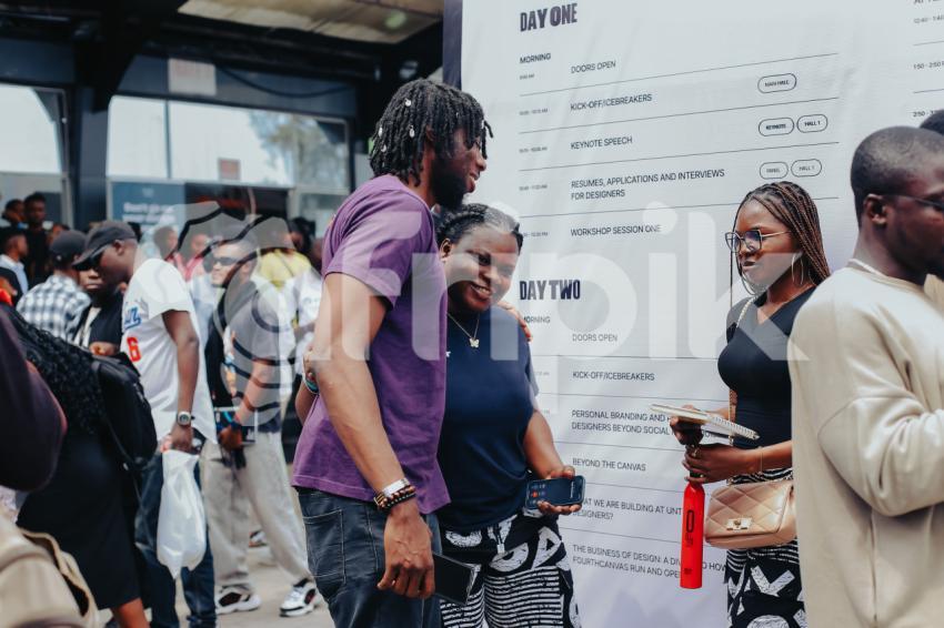 Two friends hugging at UDC 2024