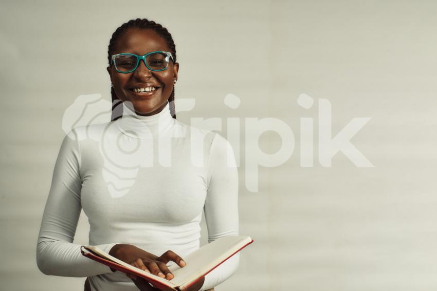 Happy girl with book