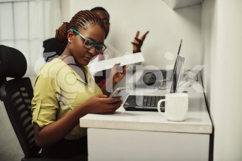 Office girl pressing phone