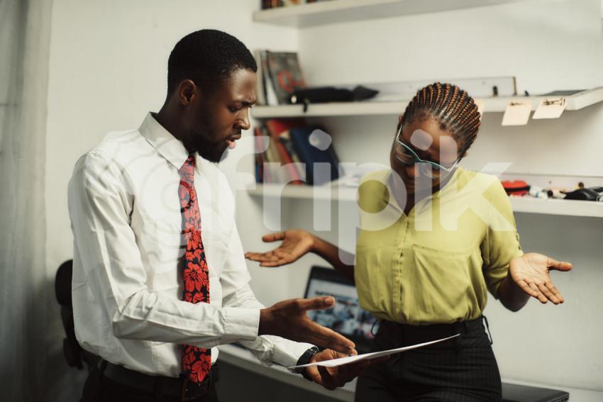 Work colleagues in confusion