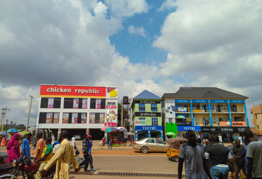 People walking on the road in the city of Minna