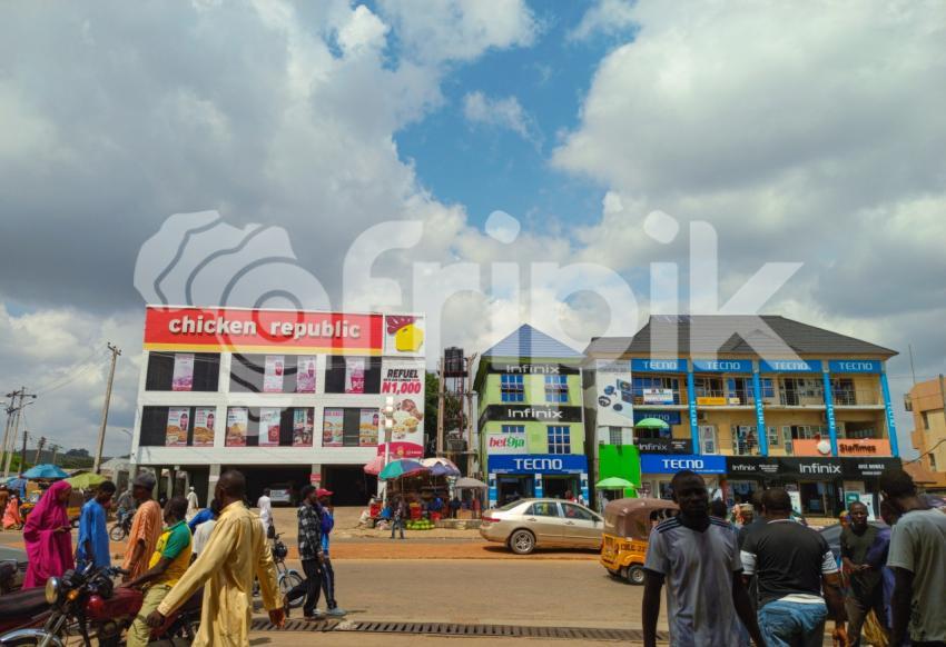 People walking on the road in the city of Minna