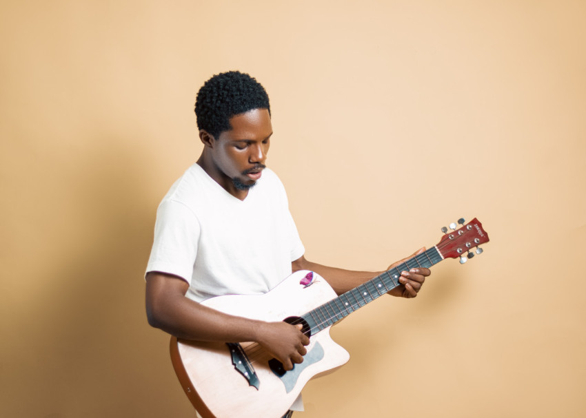 Boy playing guitar