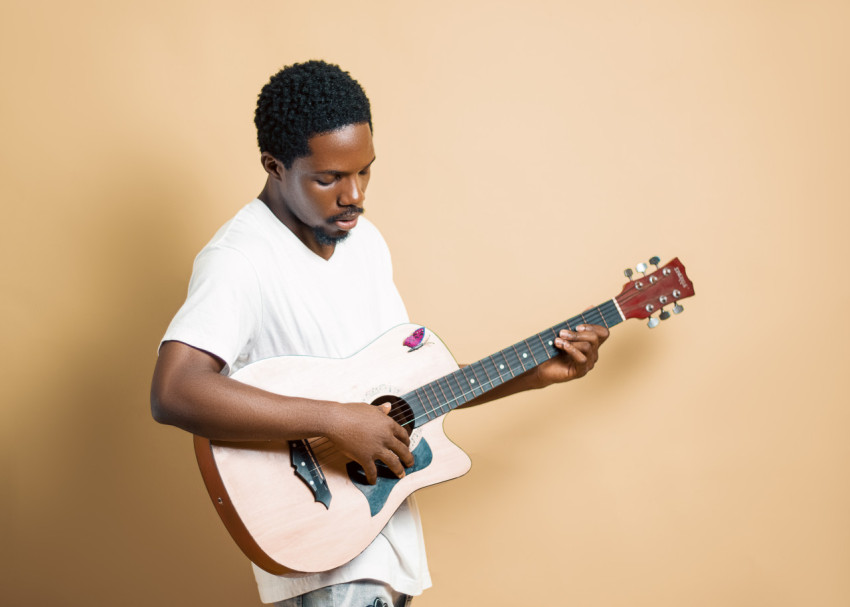 Boy playing guitar 2