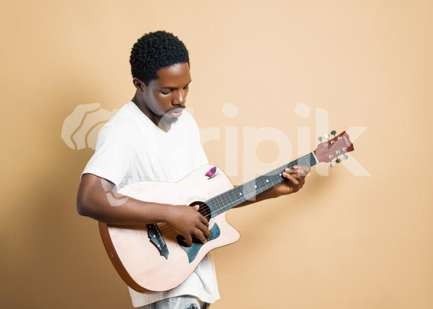 Boy playing guitar 2