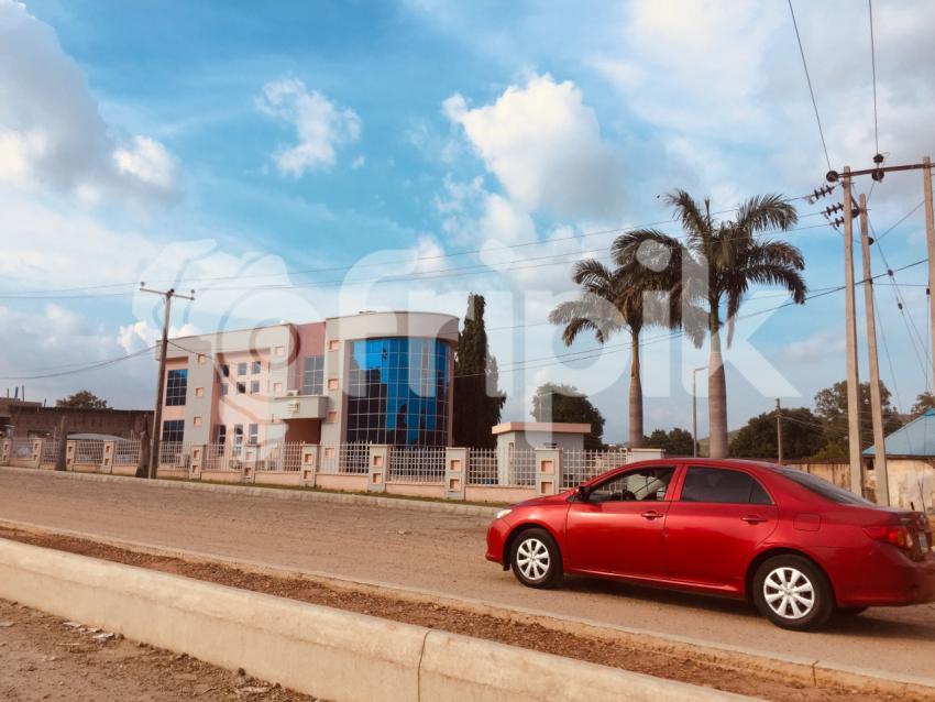 A car driving close to a building