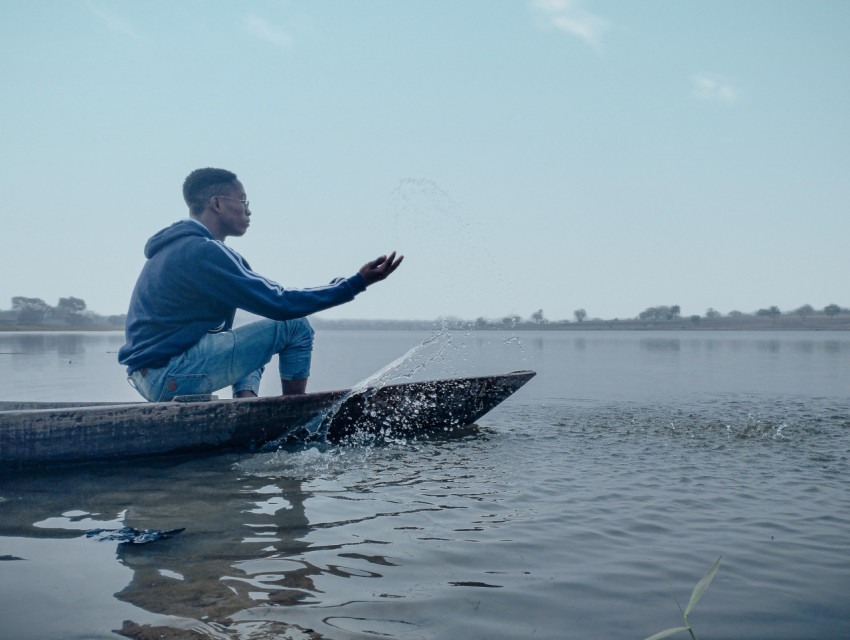 African boy on a boat