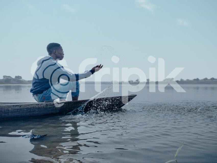 African boy on a boat