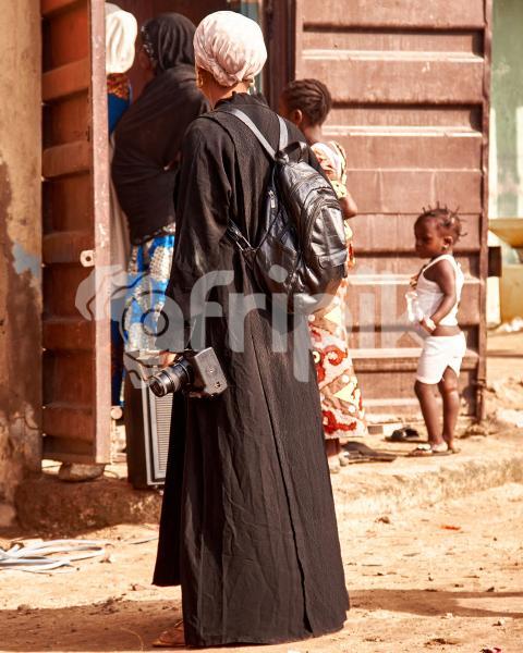 A female wedding photographer