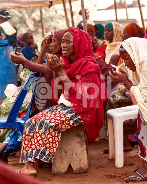 Women on hijab praying