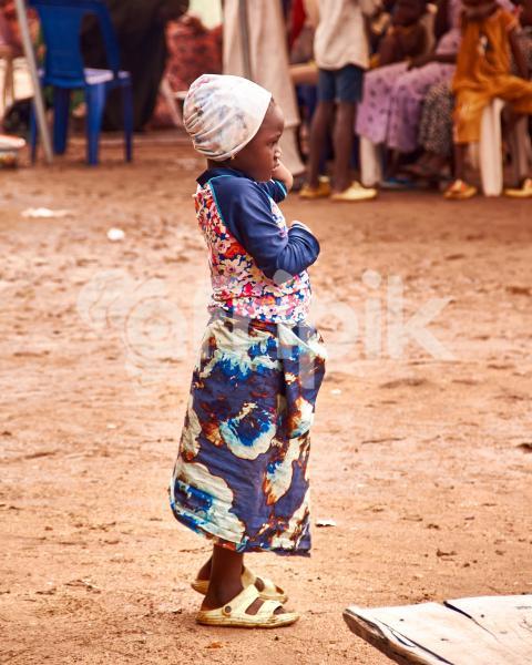 Girl standing alone outside
