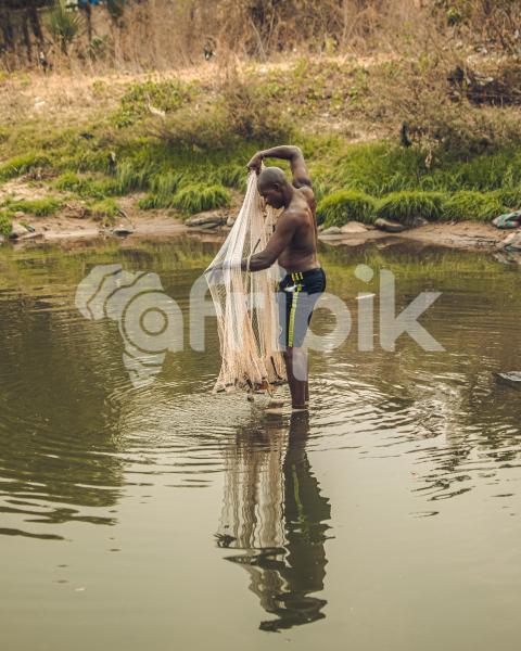 Fisherman with his fishing net