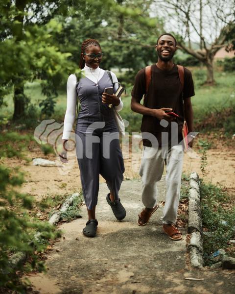 Girl and boy walking together