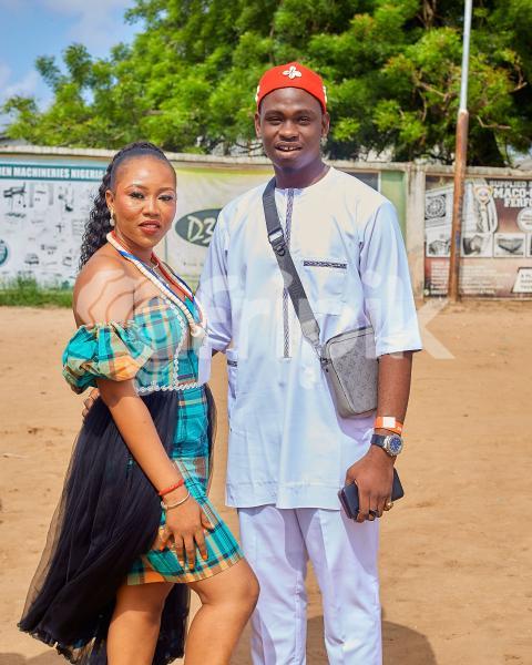 A boy and girl in traditional outfits