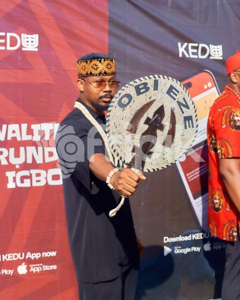 Boy posing with traditional hand fan