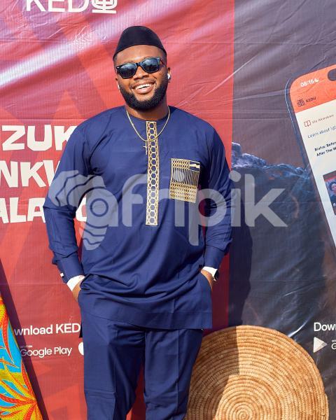 A boy wearing a traditional shirt