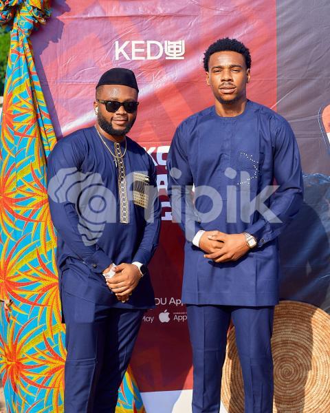 Boys posing in traditional outfits 12