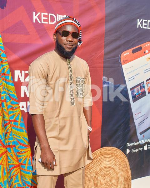 A boy wearing a traditional shirt 3